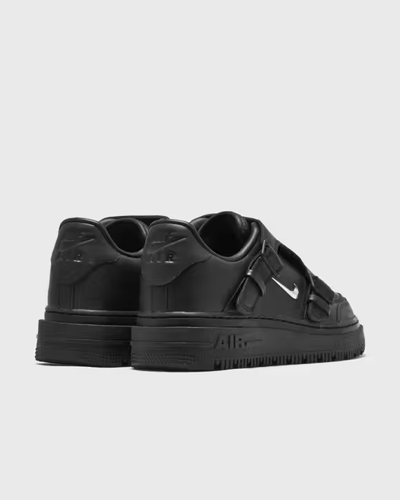 Rear view of Nike Air Force 1 Luxe pair showing heel branding