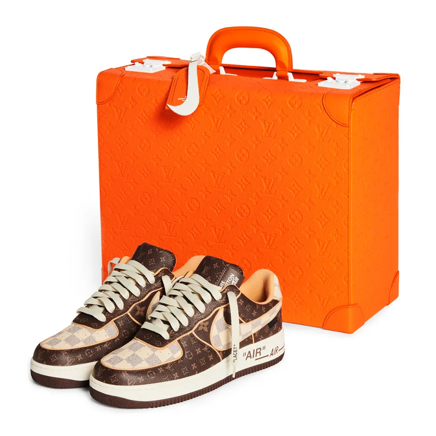 Louis Vuitton and Nike Air Force 1 pair with orange pilot case
