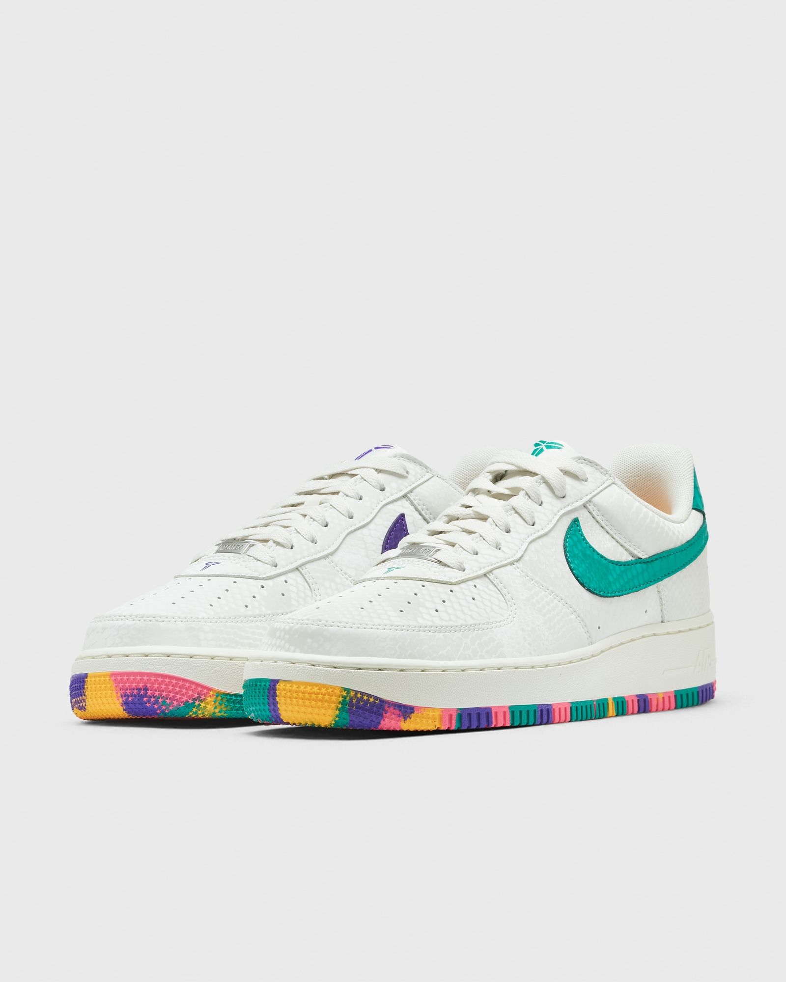 Sail Kobe Air Force 1 pair with contrasting emerald green and purple Swooshes and multicolour outsoles